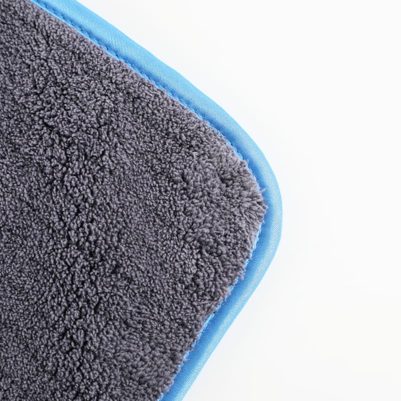 CORAL FLEECE TOWEL WITH BOUND EDGES